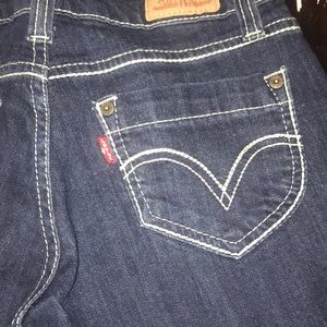 Levi 524 super low denim jeans